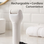 Detailed view of the interchangeable fine, medium, and coarse roller heads for the electric foot file