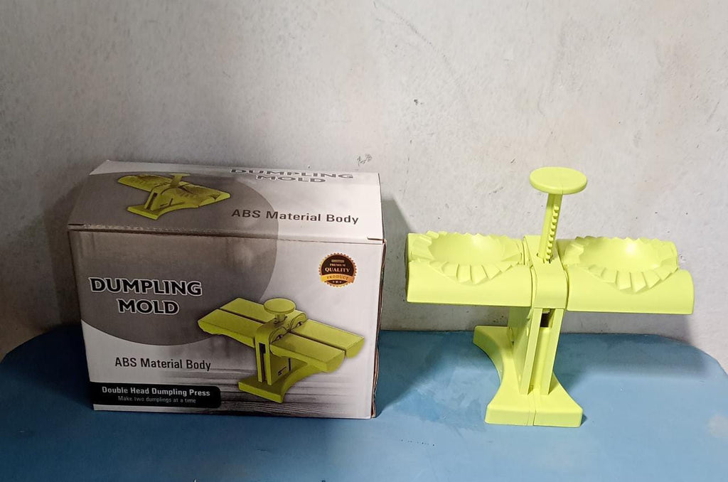 Packaging box for the double head dumpling maker mold.