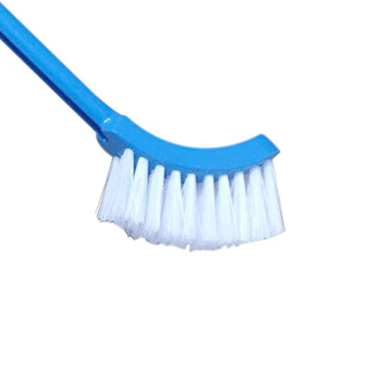 Simple and effective plastic toilet brush in a clean bathroom setting.