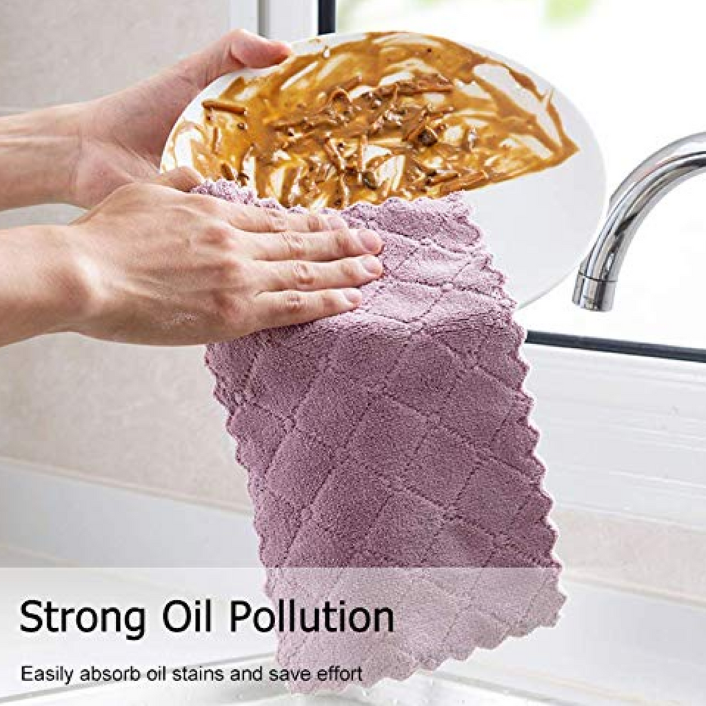 Versatile kitchen cleaning towel wiping a glass surface for a streak-free shine.