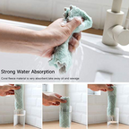 Multi-purpose cleaning cloth shown with dimensions to illustrate its compact size.