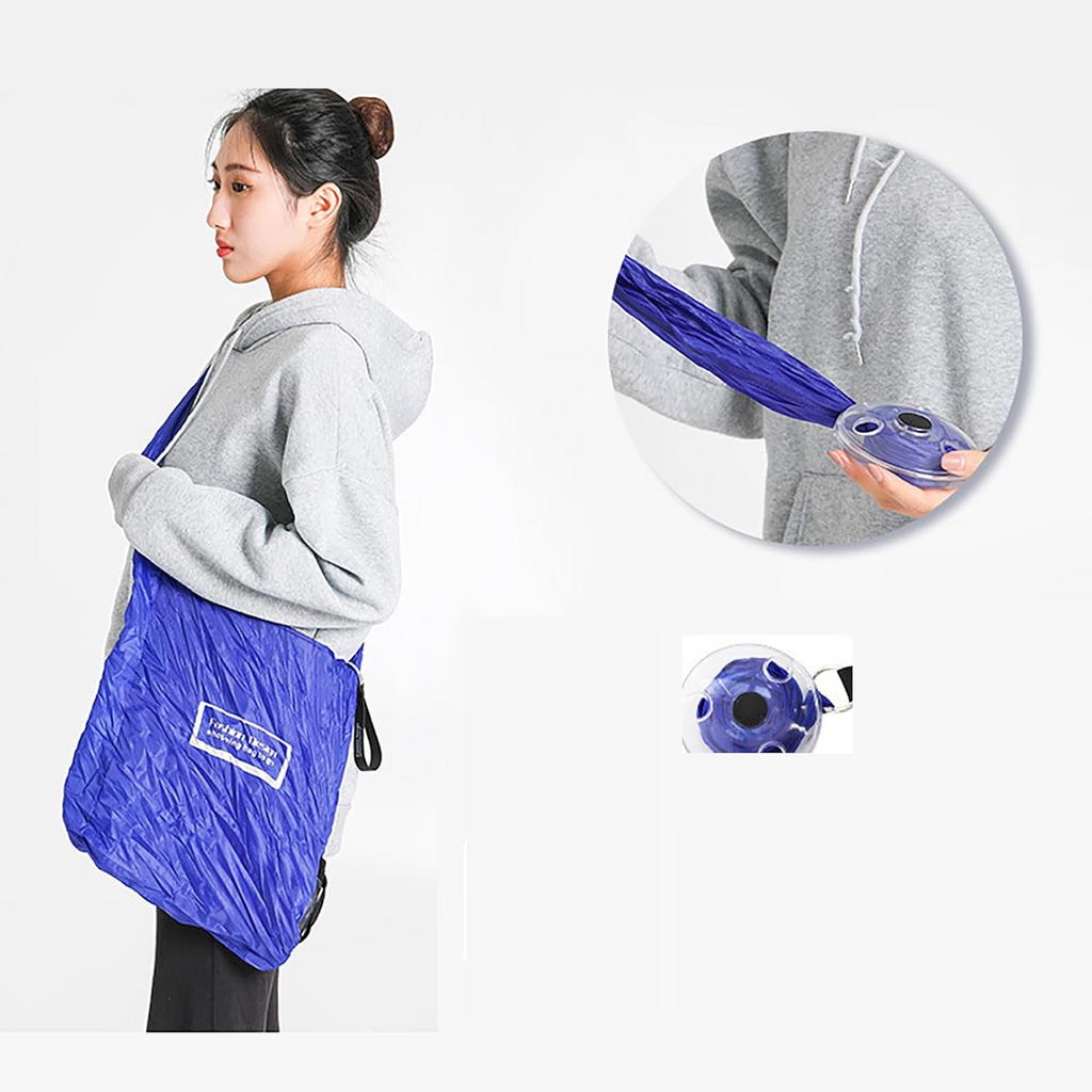 Black foldable insulated grocery bag, neatly folded for compact storage.