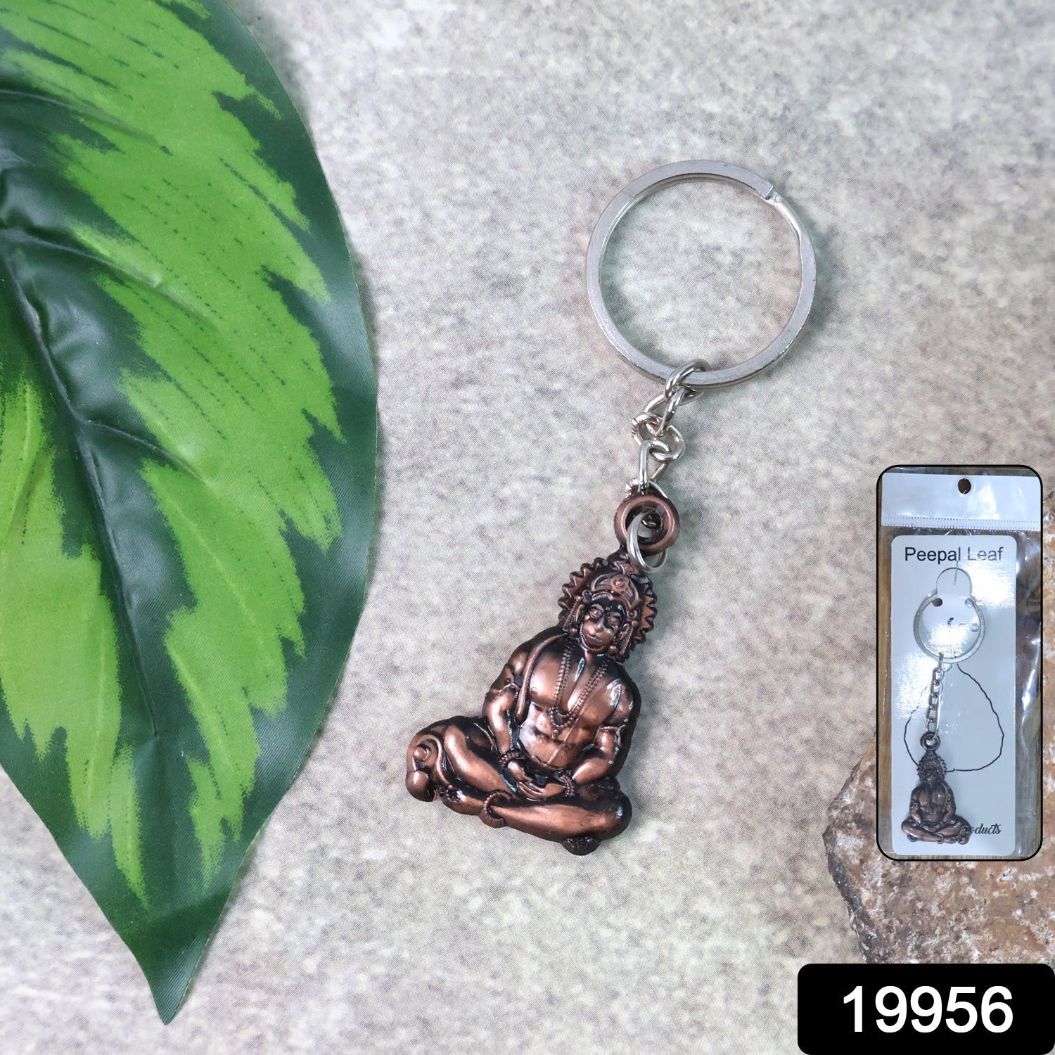 Hanuman Sitting Pose Keychain attached to keys