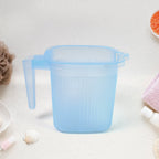 Detail of the ergonomic handle and smooth finish on a multipurpose plastic mug from Bathora.