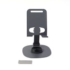 Close-up view of sturdy metallic round base of foldable mobile stand
