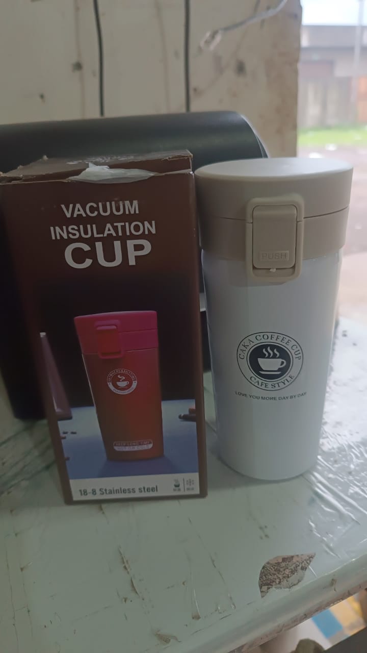 Alternative angle of  vacuum insulated coffee flask with flip lock lid