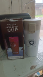Alternative angle of  vacuum insulated coffee flask with flip lock lid