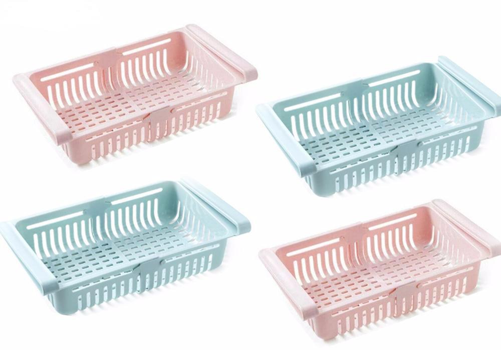 Multiple adjustable fridge storage baskets neatly arranged in a refrigerator.