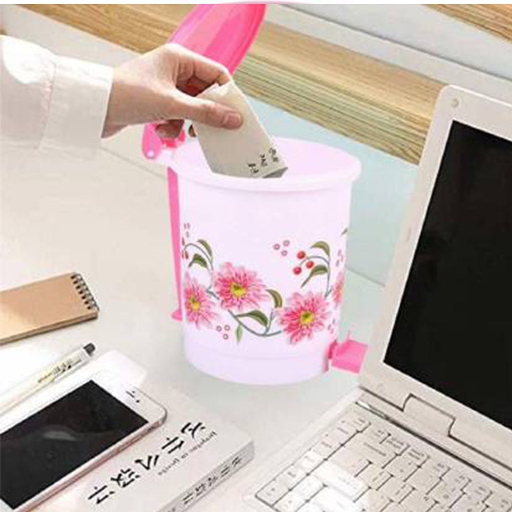 Compact plastic desk dustbin with hands-free pedal, ideal for offices and homes.