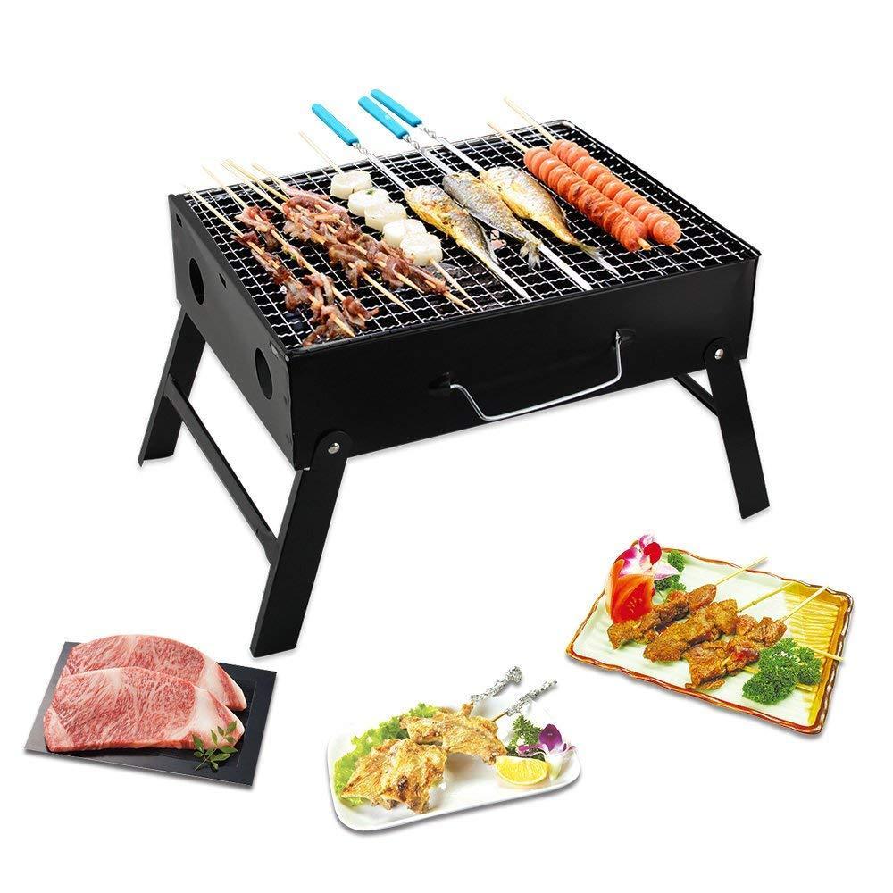 Siplix folding charcoal grill ready for outdoor cooking on a picnic table.