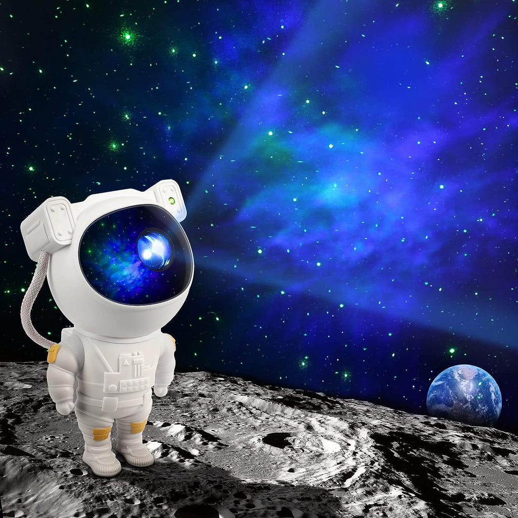 Astronaut galaxy projector displaying colorful nebulae and stars in a dark room.