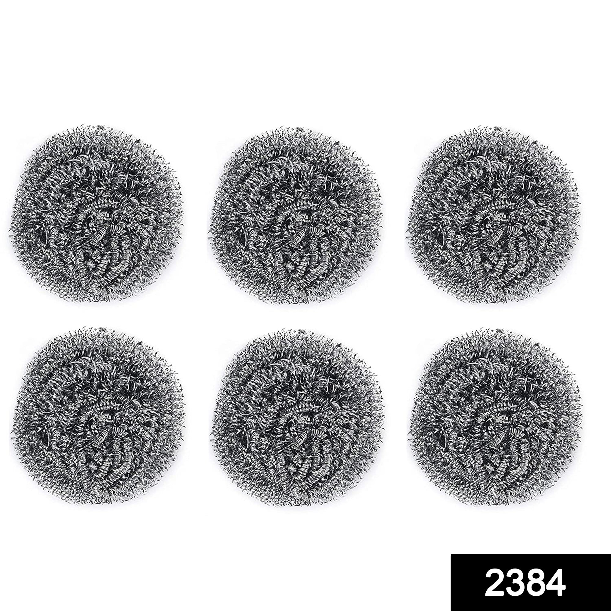 Heavy-duty stainless steel scrubber tackling tough grease on utensils.