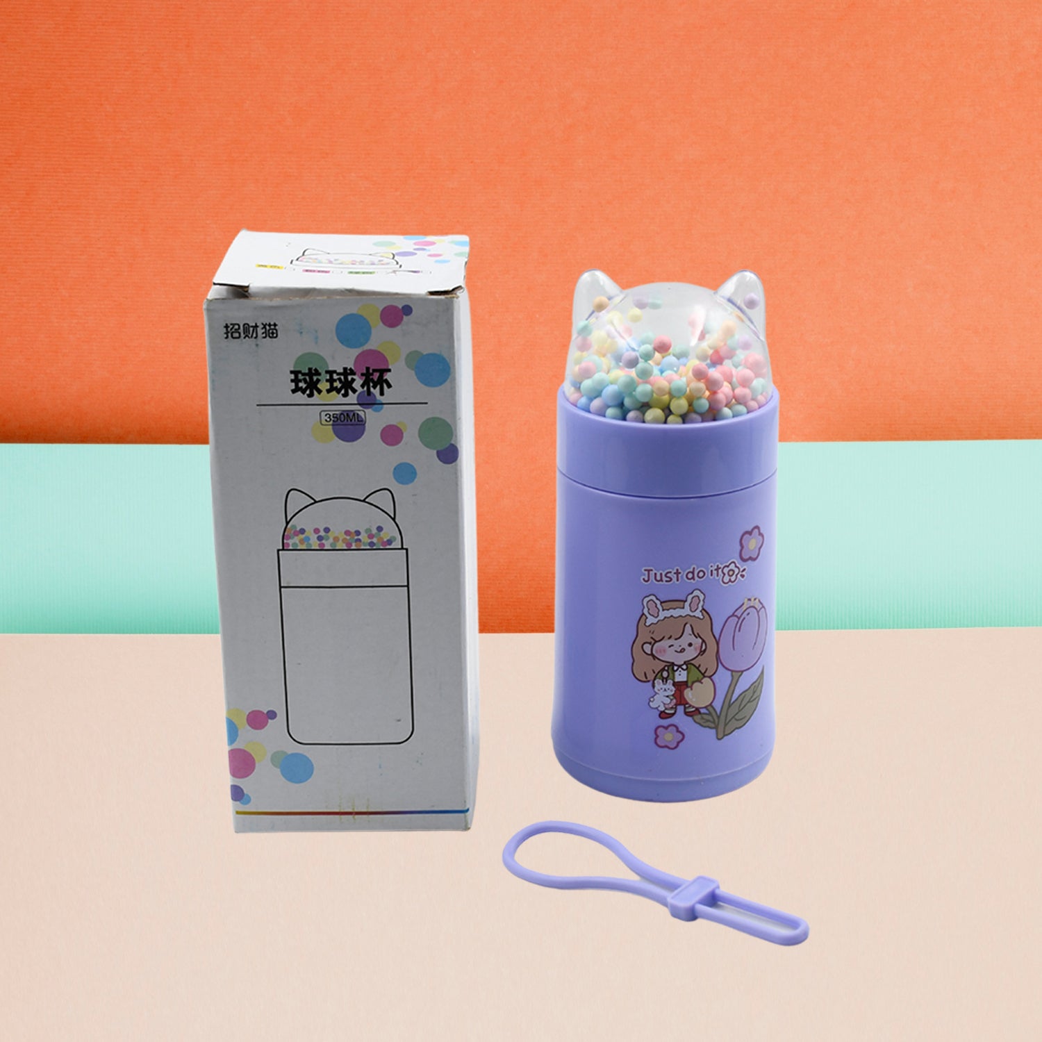 The 350ml Girl's Glass Water Bottle showcasing its glitter details and secure lid.