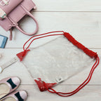 Clear waterproof stadium bag for carrying essentials to events and the gym.
