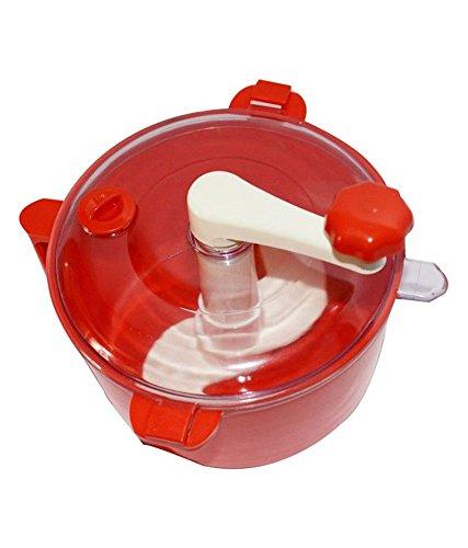 The complete Atta Maker Machine from Indo Glow, with its ergonomic handle and included measuring cups.