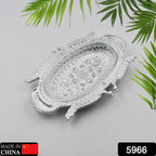 Traditional Mukhwas and dry fruit serving tray featuring a detailed, ornate border.