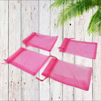 Organza gift bags filled with small items like chocolates or jewelry, ready for party favors.