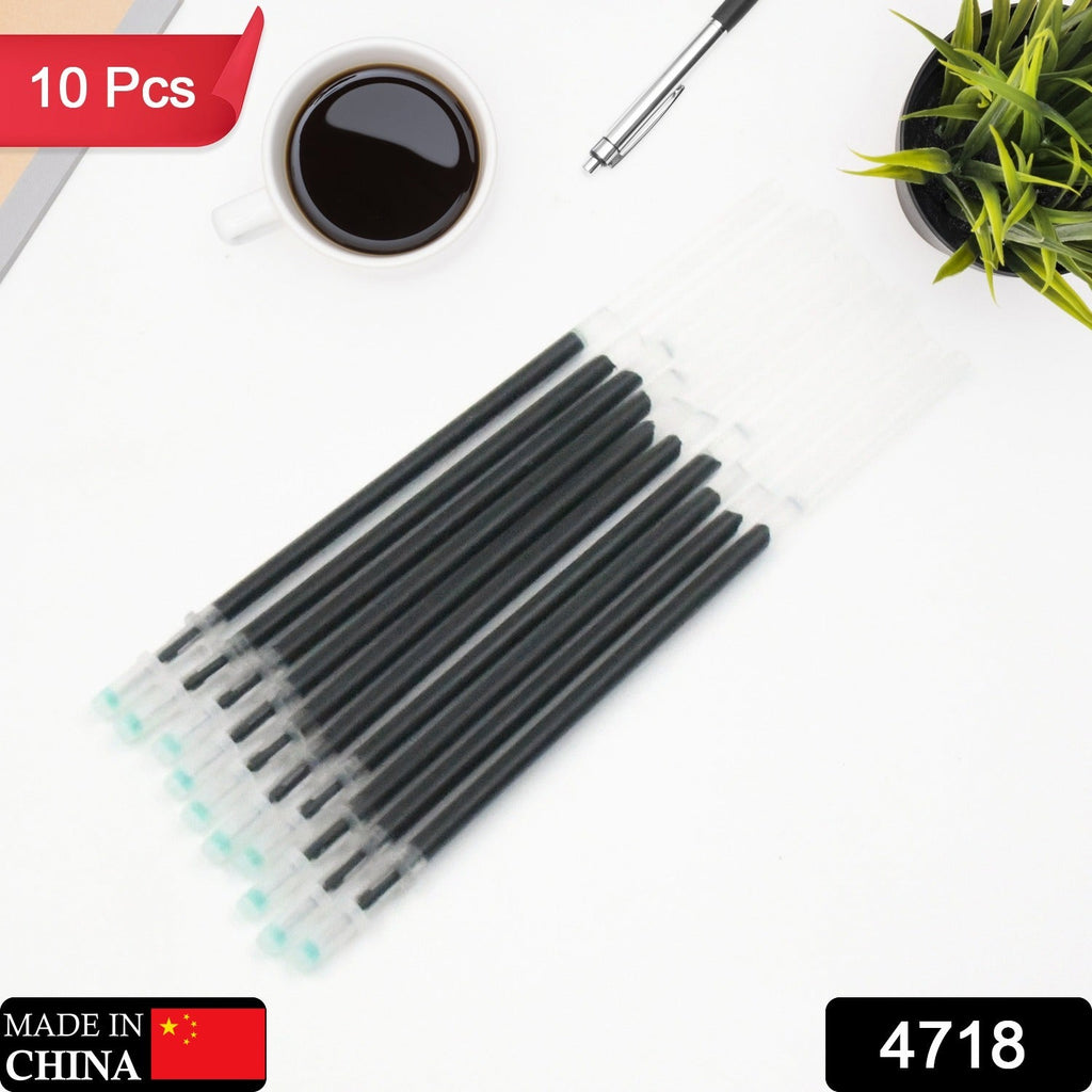 Close-up of a single universal black ball pen ink refill.