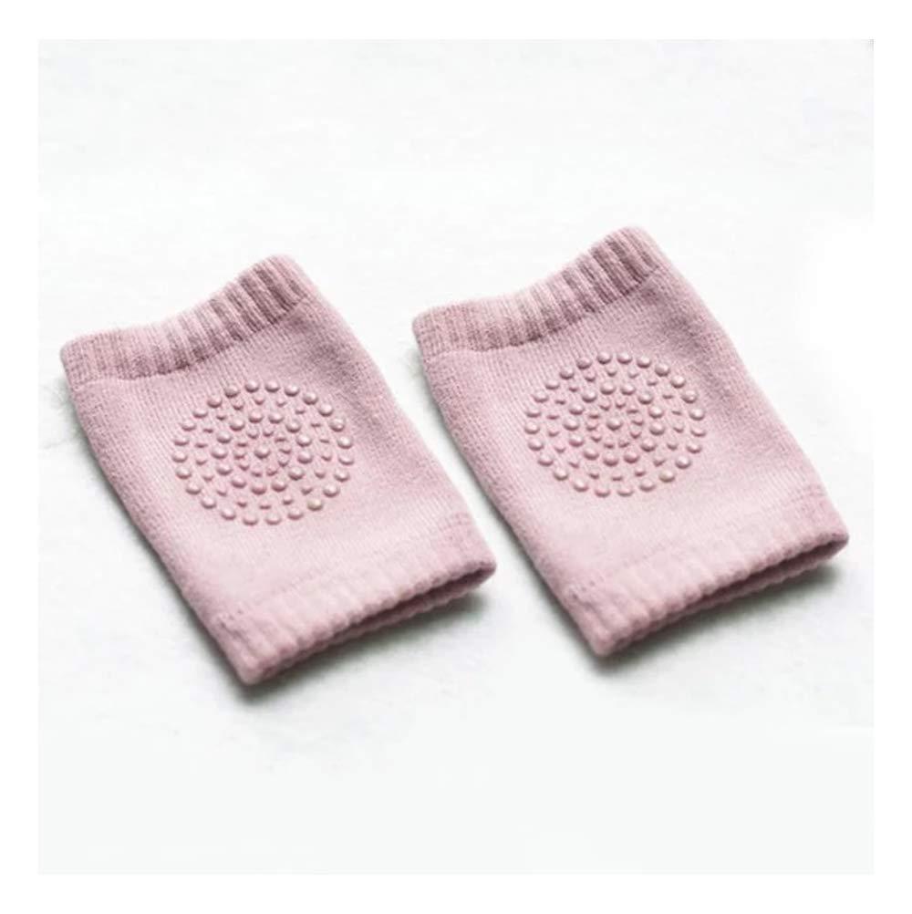 Pair of soft crawling knee pads in grey, designed for toddler comfort and safety.