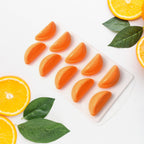 Vibrant silicone fruit ice tray with various fruit shapes.