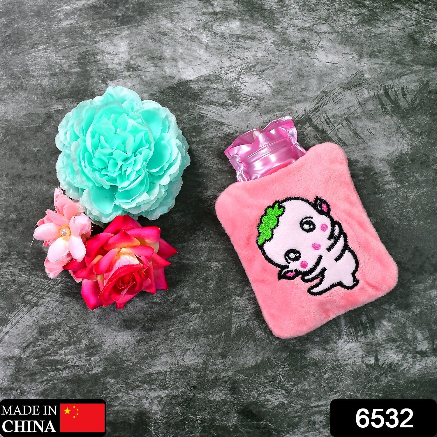 Back view of the soft-covered Pink Hot Water Bag.