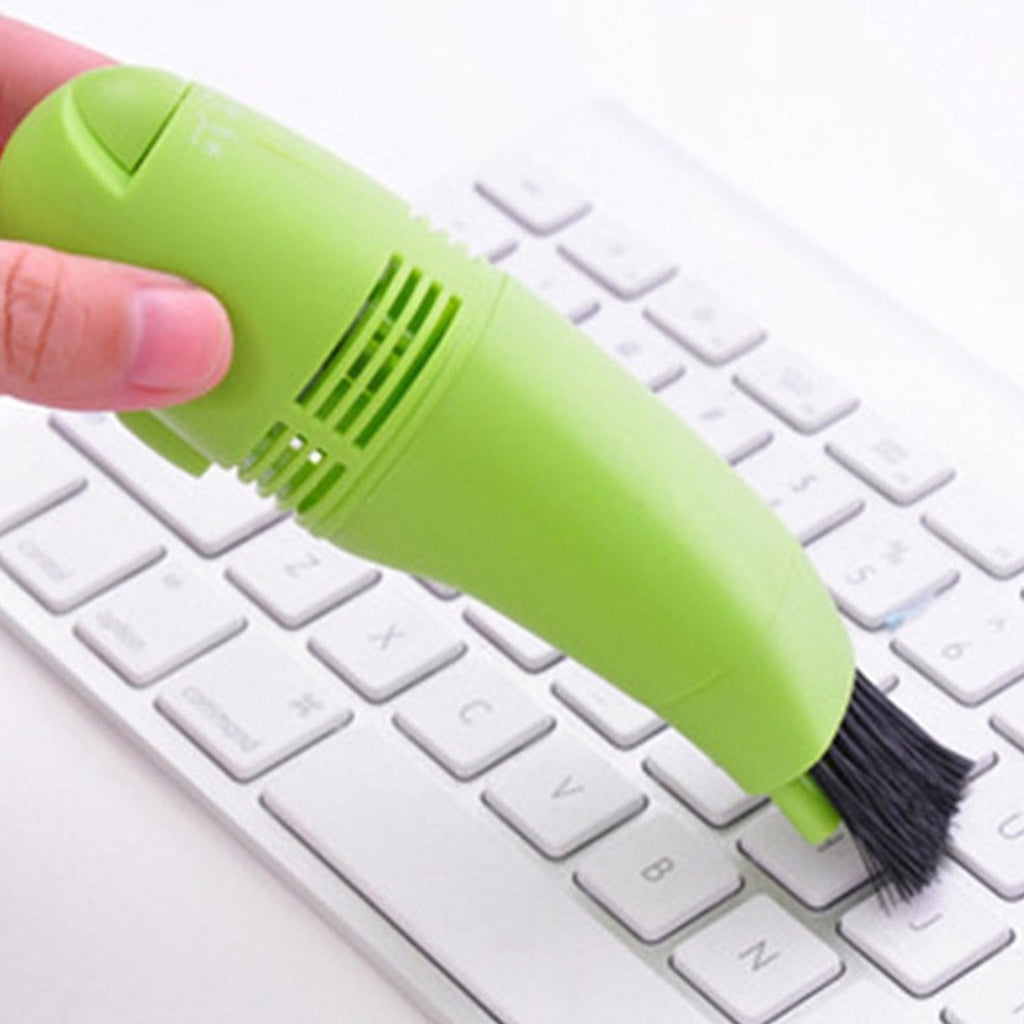 A complete set of the USB mini vacuum cleaner with charging cable.