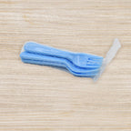 Five reusable plastic serving forks arranged elegantly, perfect for parties and events.