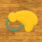 A vibrant yellow banana-shaped Baby Silicone Teether, designed for soothing infant gums.
