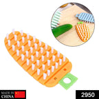 Close-up view of the flexible bristles on the vegetable scrubbing brush.