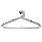 Stack of space-saving stainless steel hangers, highlighting their slim profile for closet organization.