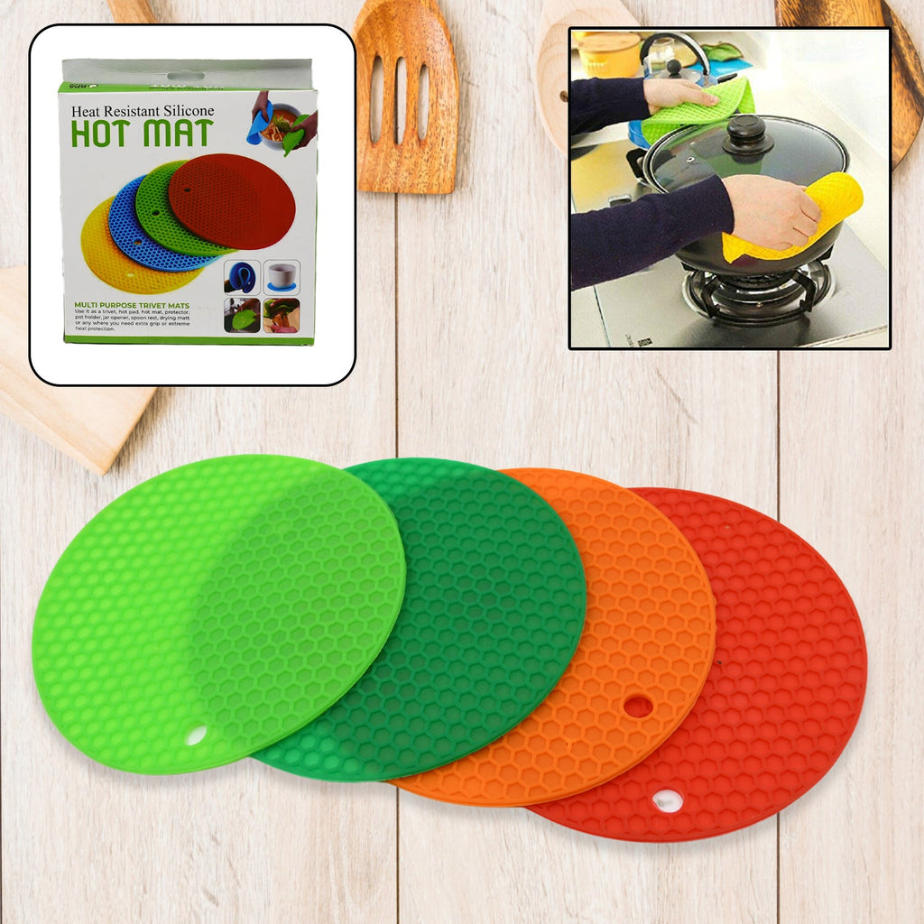 A single red silicone hot pot mat with a textured, non-slip surface.