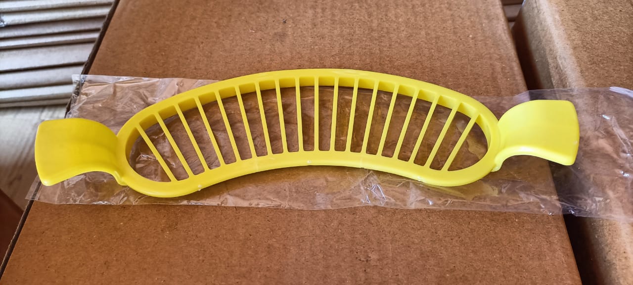 Efficient banana slicer, perfect for quick and safe fruit preparation.