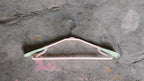 Compact and robust PP clothes hanger, perfect for optimizing closet space.