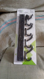 Eco-friendly adhesive and mounting accessories for the GlimmerHome coat hanger.