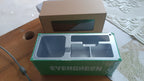 Modern desk organizer styled as a container with several storage compartments.