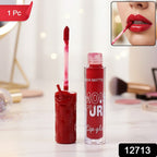 Precision applicator wand applying matte liquid lip gloss evenly
