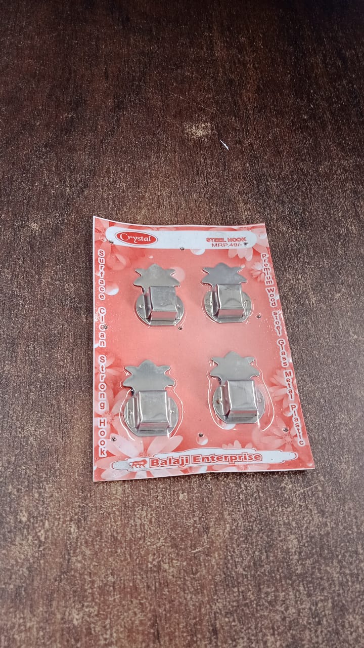 Vertical arrangement of four wall-mounted agarbatti holders in silver