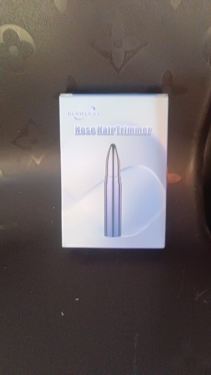 Portable and lightweight electric nose hair trimmer for travel