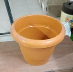 Close-up of the drainage holes on the bottom of the durable garden pot.