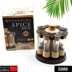 A hand selecting a spice jar from the 360-degree revolving spice rack, showcasing its ease of use.