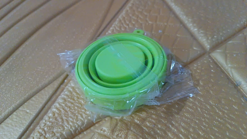 Portable foldable silicone travel mug, a single unit for daily adventures.