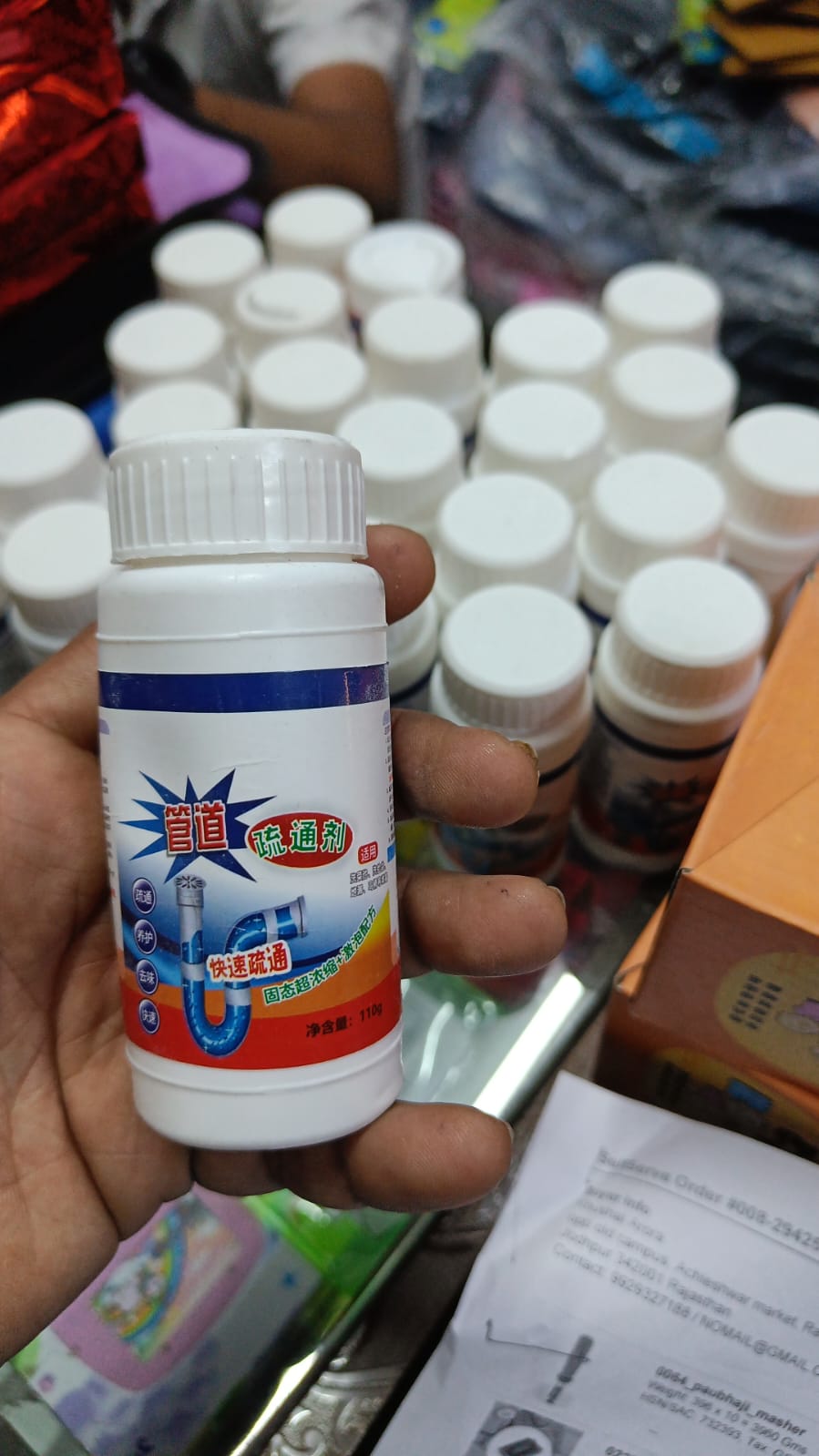 Close-up of the potent white powder, the active agent of this drain cleaner.