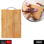 Top view of the natural wooden cutting board, highlighting its grain and smooth surface.