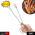 Stainless steel BBQ tongs gripping charcoal for outdoor grilling.