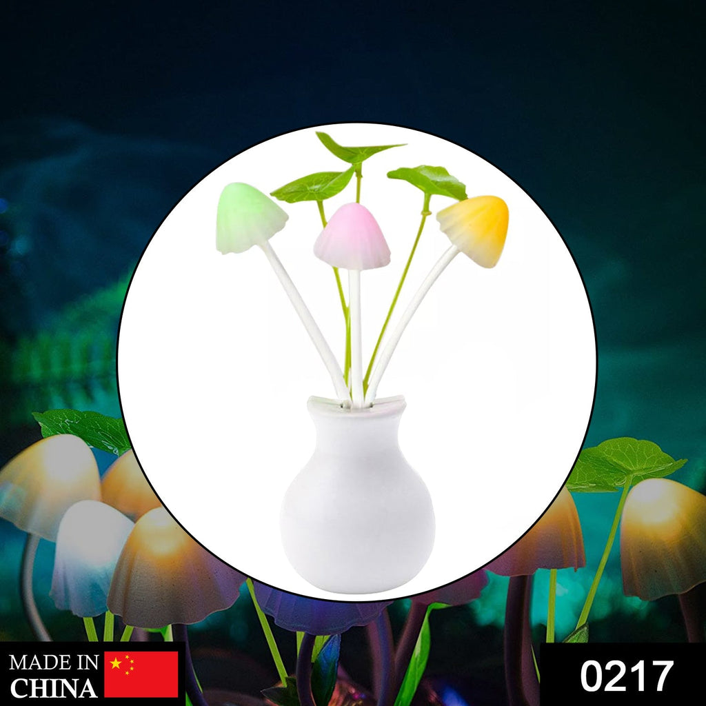 Close-up of a vibrant multicolor mushroom night light with artificial flowers.