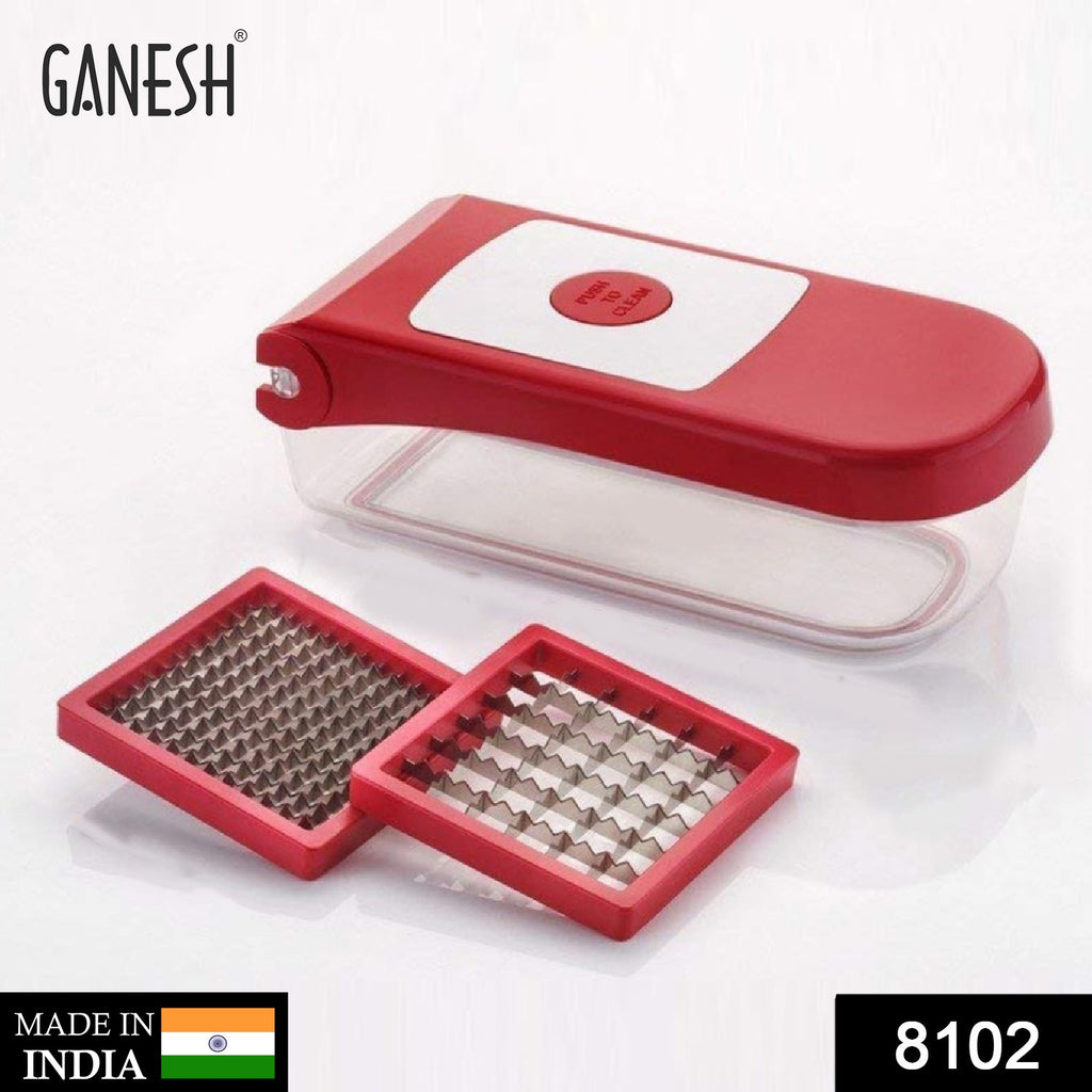 Ganesh red plastic fruit cutter, ready for use on a kitchen counter.