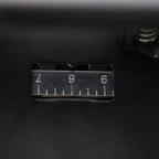 Close-up of hole punch area on metal 2-hole paper punch machine