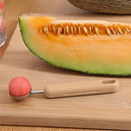Top view of the 2-in-1 fruit scooper and cutter tool