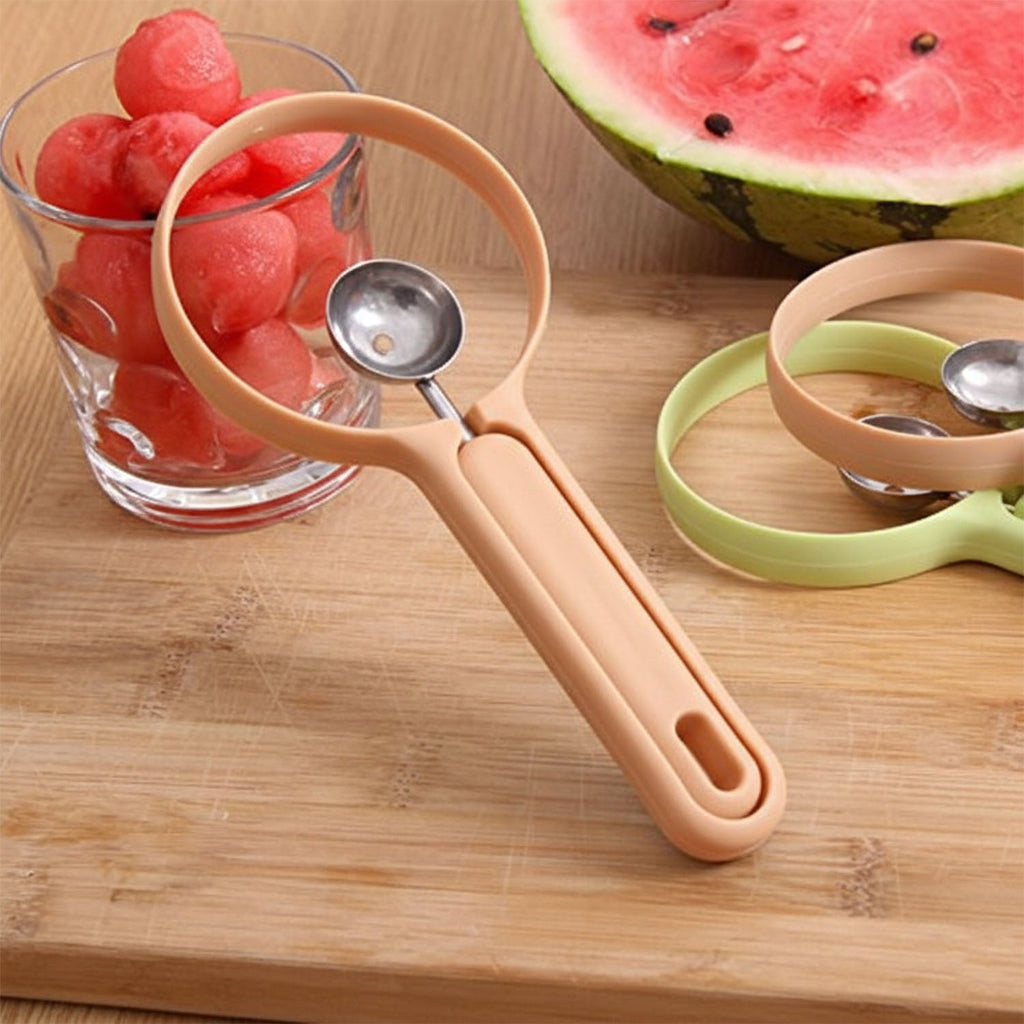 Fruit scooper and cutter tool displayed in kitchen setting