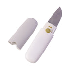 Detailed shot of the folding mechanism, showing the blade and ergonomic handle.